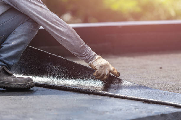 Professional Basement Waterproofing technician working in Amelia, OH